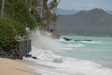 Wave crashing against seawall